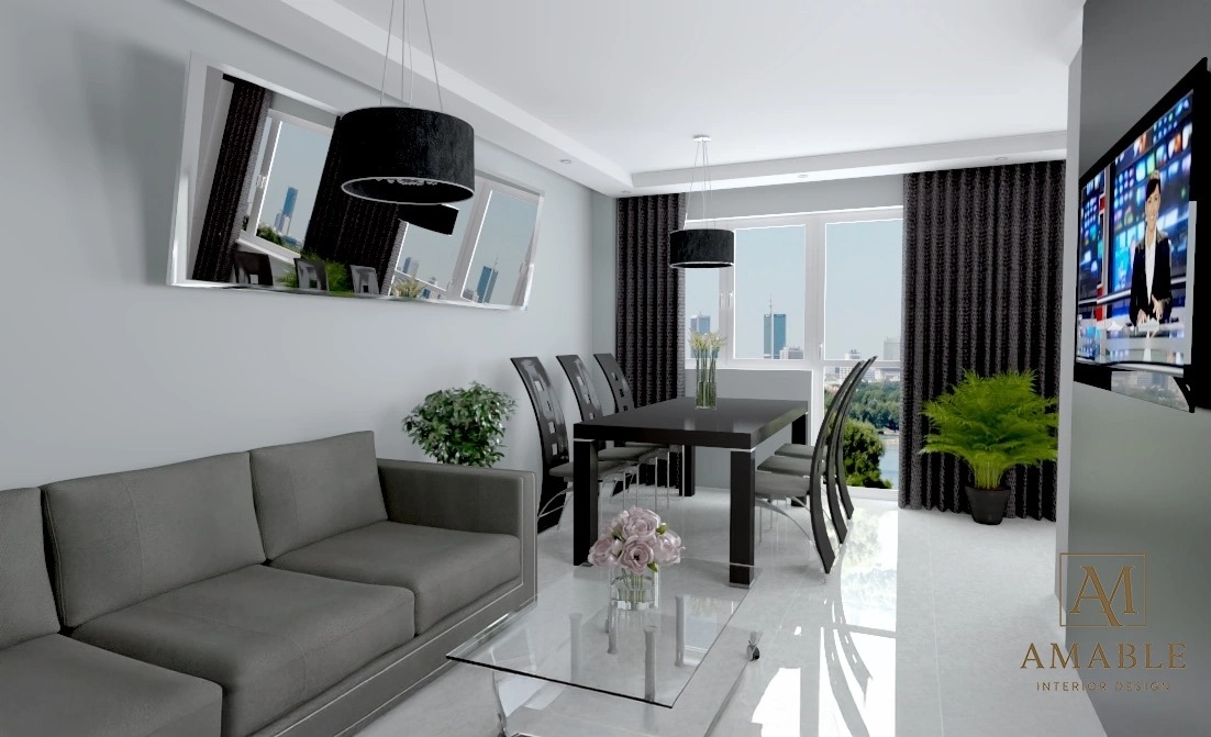 Nowoczesny salon z szarą sofą, jadalnią z czarnym stołem i krzesłami, dużym oknem z widokiem na miasto. Lustro na ścianie odbija przestrzeń. Minimalistyczny design.