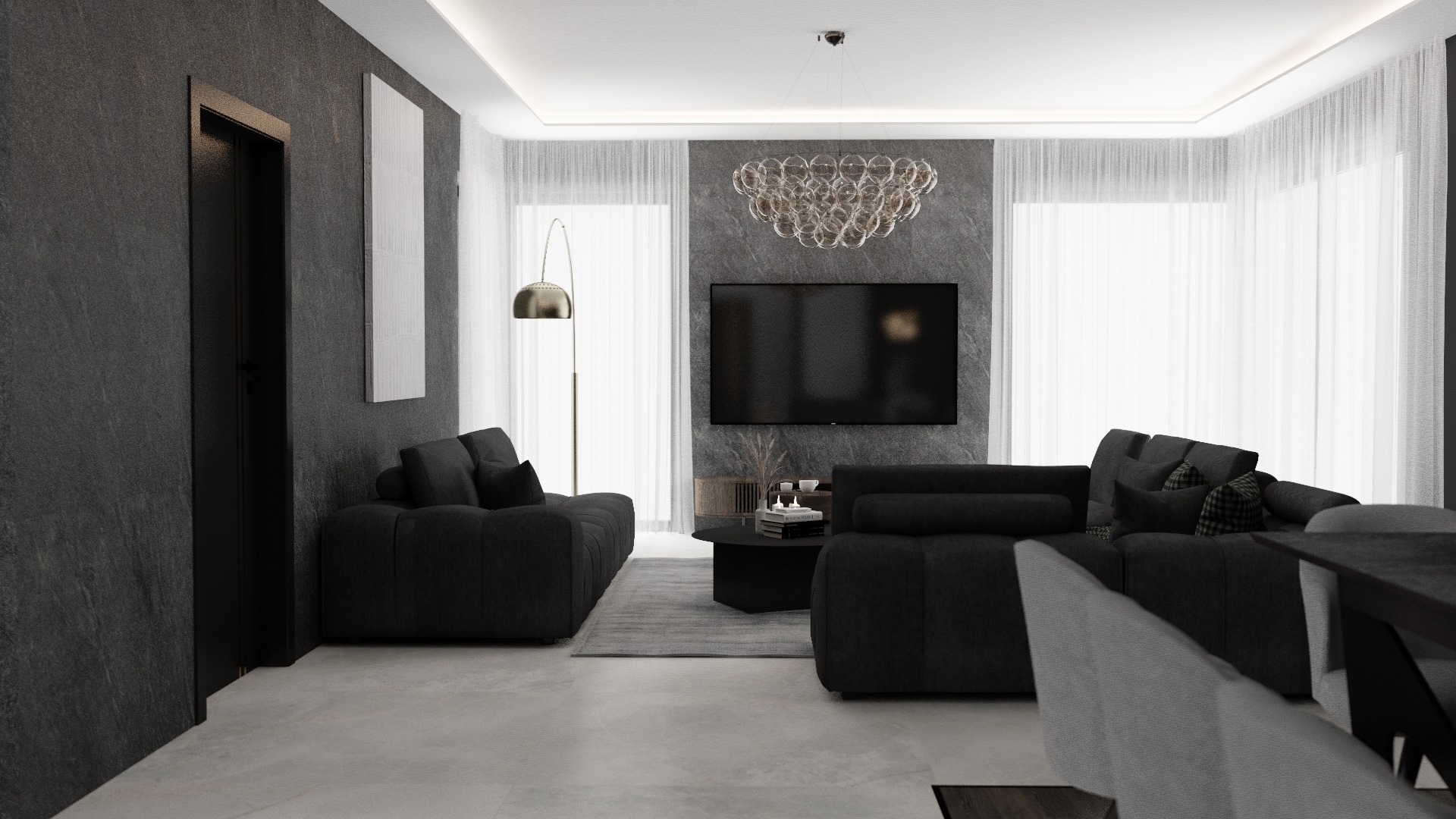 Nowoczesny salon w odcieniach szarości z ciemnoszarą sofą modułową, okrągłym stolikiem kawowym, marmurową ścianą z telewizorem i dekoracyjnym, szklanym żyrandolem.