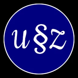 Logo firmy prawniczej z inicjałami U§Z w białym, ozdobnym kroju pisma na granatowym tle wewnątrz białego okręgu.