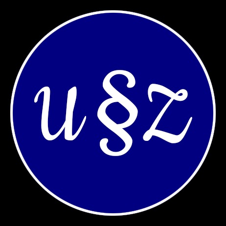 Logo firmy prawniczej z inicjałami U§Z w białym, ozdobnym kroju pisma na granatowym tle wewnątrz białego okręgu.