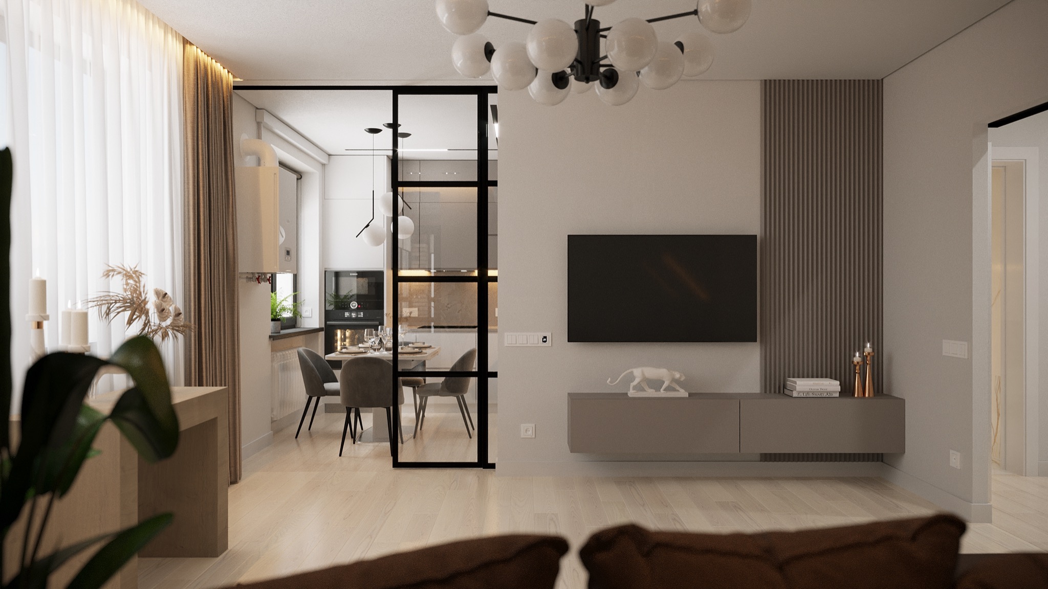 Salon z jadalnią w neutralnych barwach, szklana ściana działowa z czarnymi szprosami, nowoczesna lampa sufitowa z białymi kulami, telewizor na ścianie z dekoracyjną lamelią, minimalistyczna szafka...