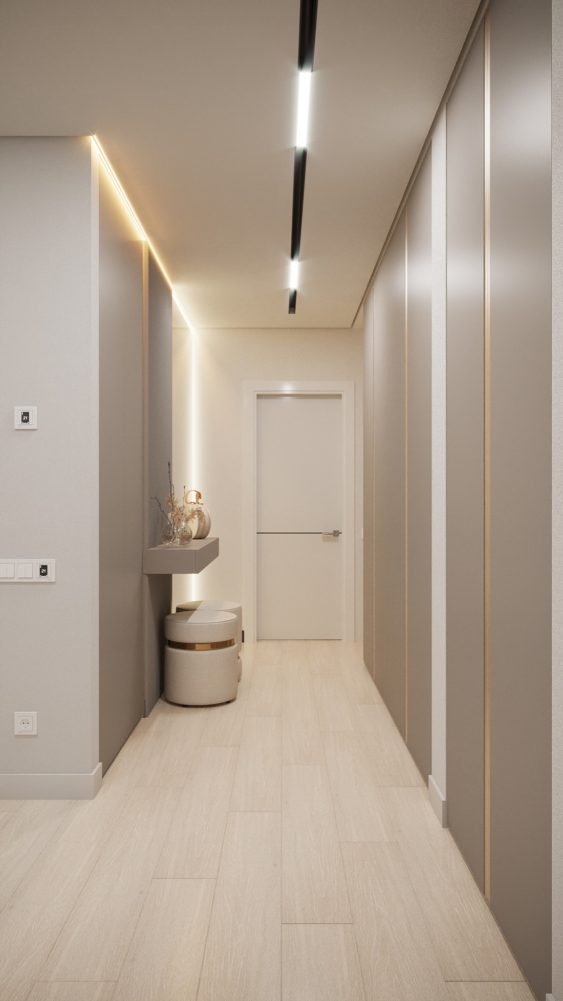 Nowoczesny korytarz w odcieniach szarości z drewnianą podłogą, oświetleniem LED w suficie i pionowymi panelami ściennymi z delikatnymi złotymi akcentami, mała konsola z dekoracjami i okrągłym pufem.