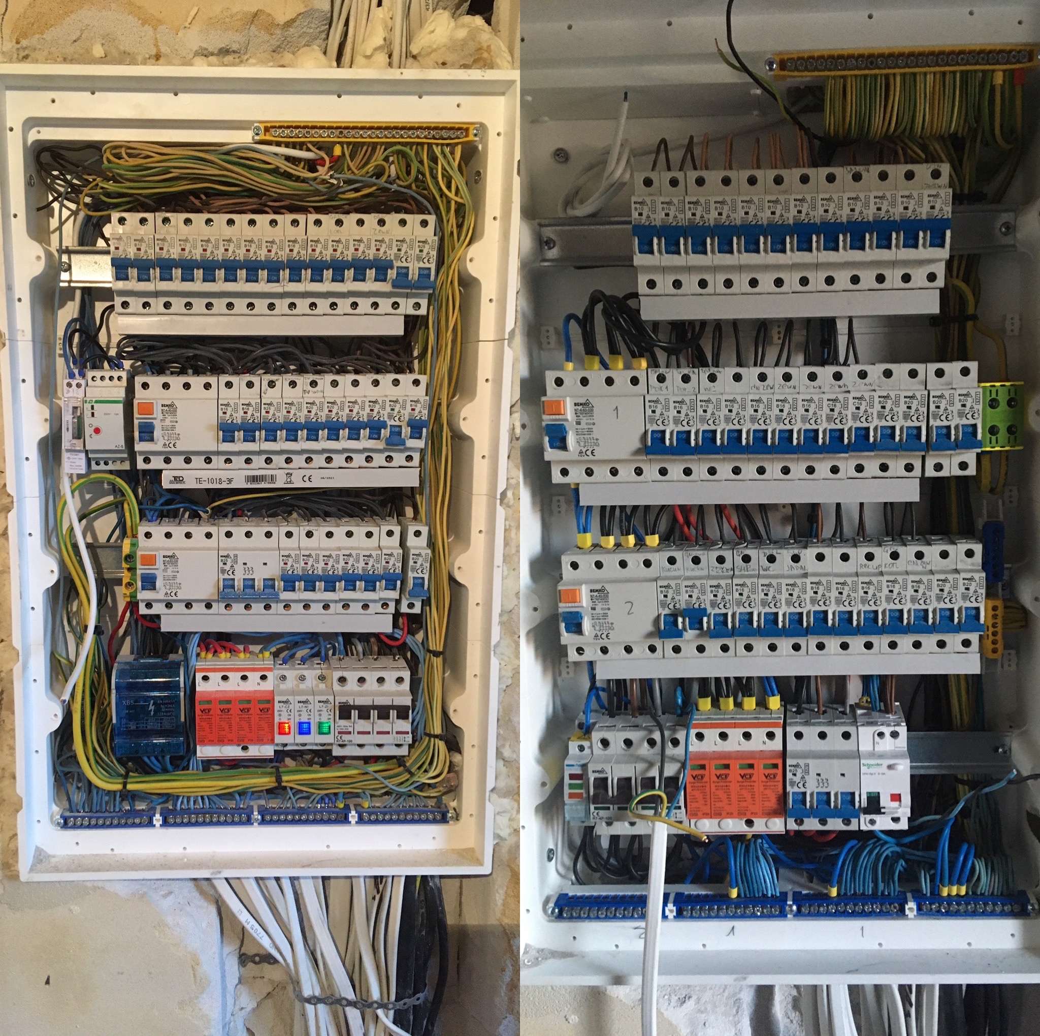 Dwa otwarte panele elektryczne z widocznymi bezpiecznikami, przewodami i listwami zaciskowymi, zamontowane na surowej ścianie.