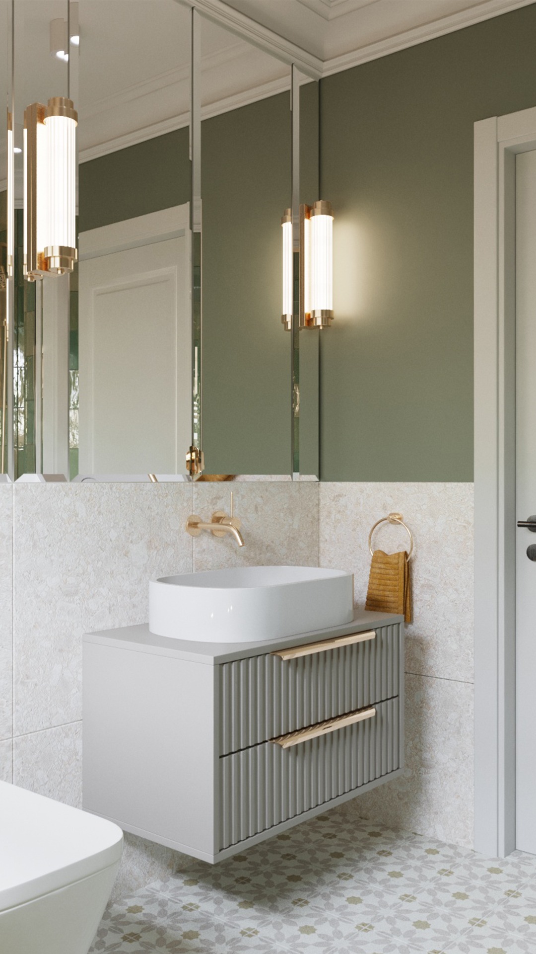 Nowoczesna łazienka z umywalką nablatową, szafką z ryflowanymi frontami i złotymi akcentami, oświetlona dekoracyjnymi lampami ściennymi i wiszącymi, z lustrem w ozdobnej ramie i wzorzystą podłogą.