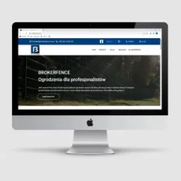 Ekran komputera iMac wyświetlający stronę internetową firmy Brokerfence, specjalizującej się w ogrodzeniach dla profesjonalistów, z widocznym adresem brokerfence.com i numerem telefonu
