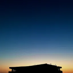 Sylwetka budynku na tle gradientu nieba o zachodzie słońca, od ciemnego błękitu do pomarańczu.