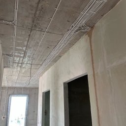 Construction YM - Perfekcyjna Wymiana Instalacji Elektrycznej w Mieszkaniu