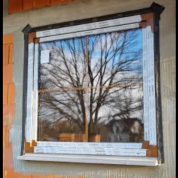 Okna na profilu Salamander w szczelnym montażu (ciepły parapet, taśmy, piana, kotwy)