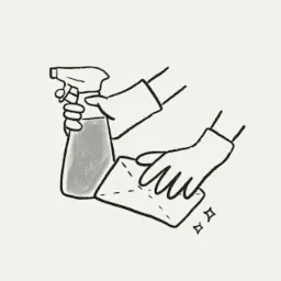 Ilustracja przedstawiająca ręce w rękawicach czyszczące powierzchnię ścierką i spryskiwaczem.