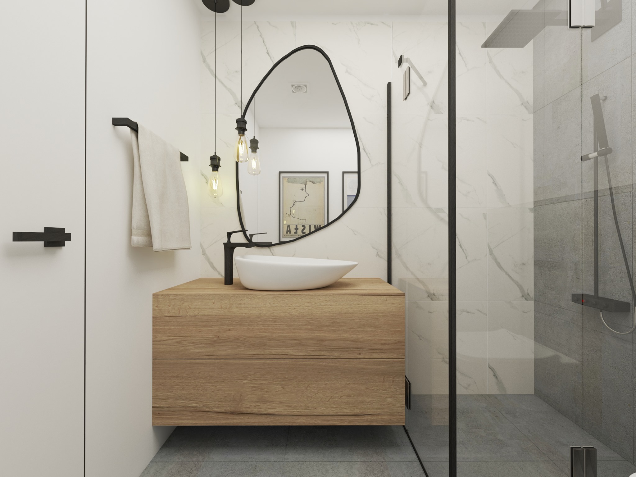 Nowoczesna łazienka z drewnianą szafką pod umywalką, asymetrycznym lustrem w czarnej ramie i szklanym prysznicem walk-in, oświetlona wiszącymi żarówkami.