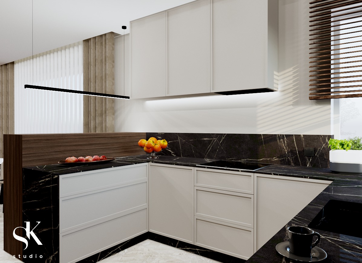 Wizualizacja nowoczesnej kuchni z białymi szafkami, blatem z czarnego marmuru, owocami w misach i czarną lampą liniową pod sufitem.