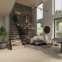 Nowoczesny salon z wysokim sufitem, schodami z drewnianymi stopniami, regałem na książki wbudowanym w ścianę z ciemnej cegły i beżową sofą narożną.