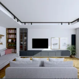 Jasne wnętrze salonu z szarą sofą, drewnianą mapą świata na ścianie, regałem z książkami i szafką RTV pod telewizorem. Minimalistyczny design z akcentami roślinnymi.