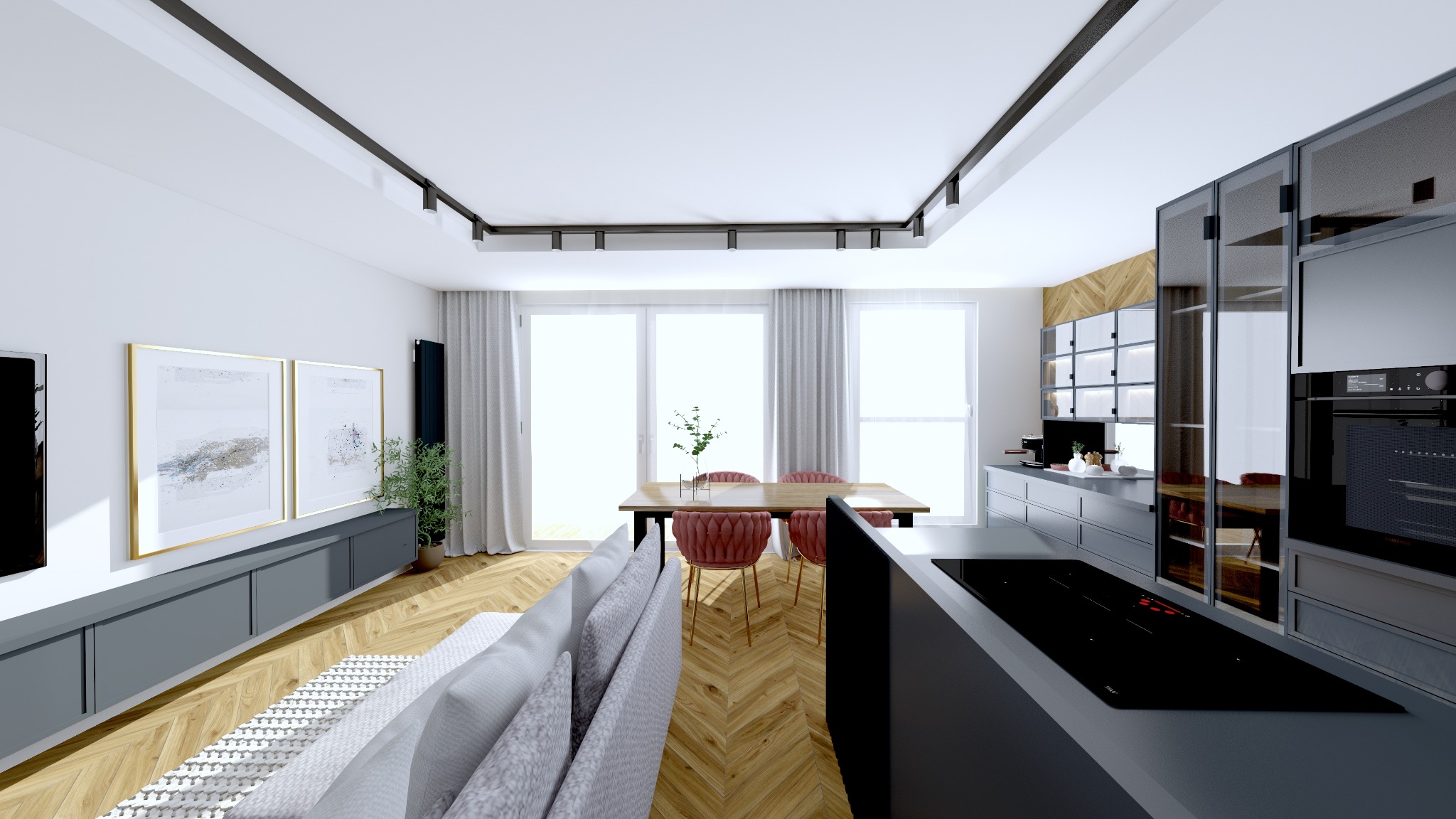 Salon z aneksem kuchennym: parkiet w jodełkę, szara zabudowa, stół z różowymi krzesłami, minimalistyczne oświetlenie i grafiki na ścianie. Nowoczesny design.