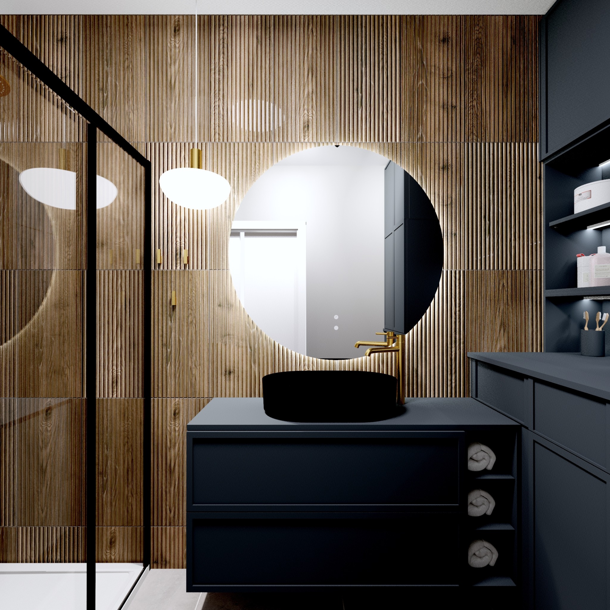 Nowoczesna łazienka z drewnianą ścianą, okrągłym lustrem i czarną umywalką na granatowej szafce. W tle kabina prysznicowa i półki z akcesoriami.