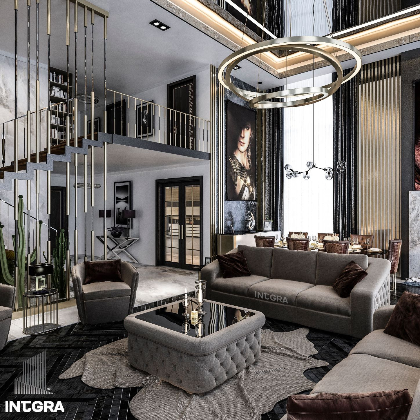 Elegancki salon z antresolą, szarymi sofami z poduszkami, stolikiem kawowym z czarnym blatem, okrągłym żyrandolem i schodami z metalowymi barierkami, widok na stół jadalny w tle.