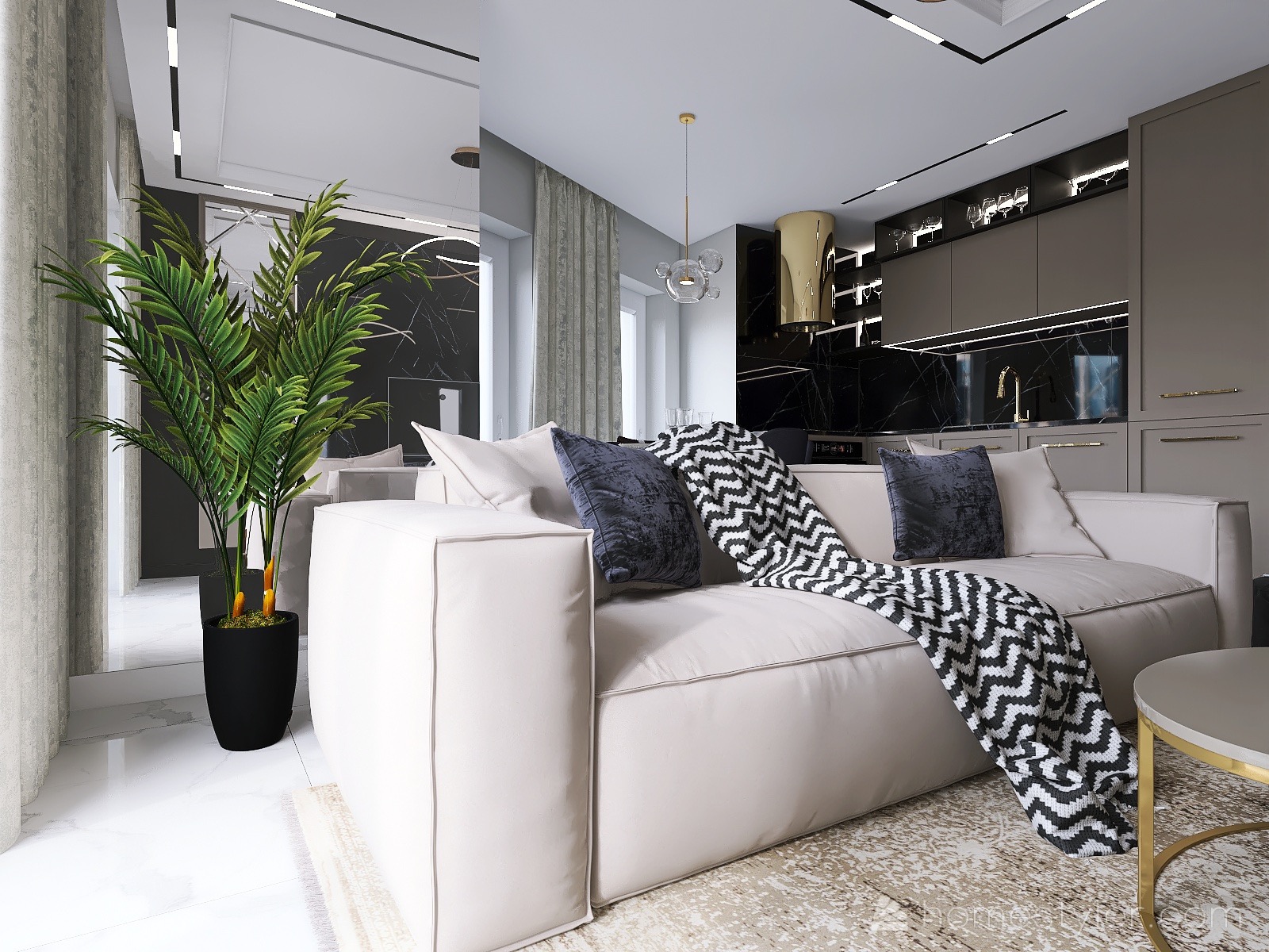 Nowoczesny salon z beżową sofą, czarnymi poduszkami i geometrycznym pledem, na tle czarnej marmurowej ściany w kuchni z złotymi akcentami i rośliną doniczkową w rogu.