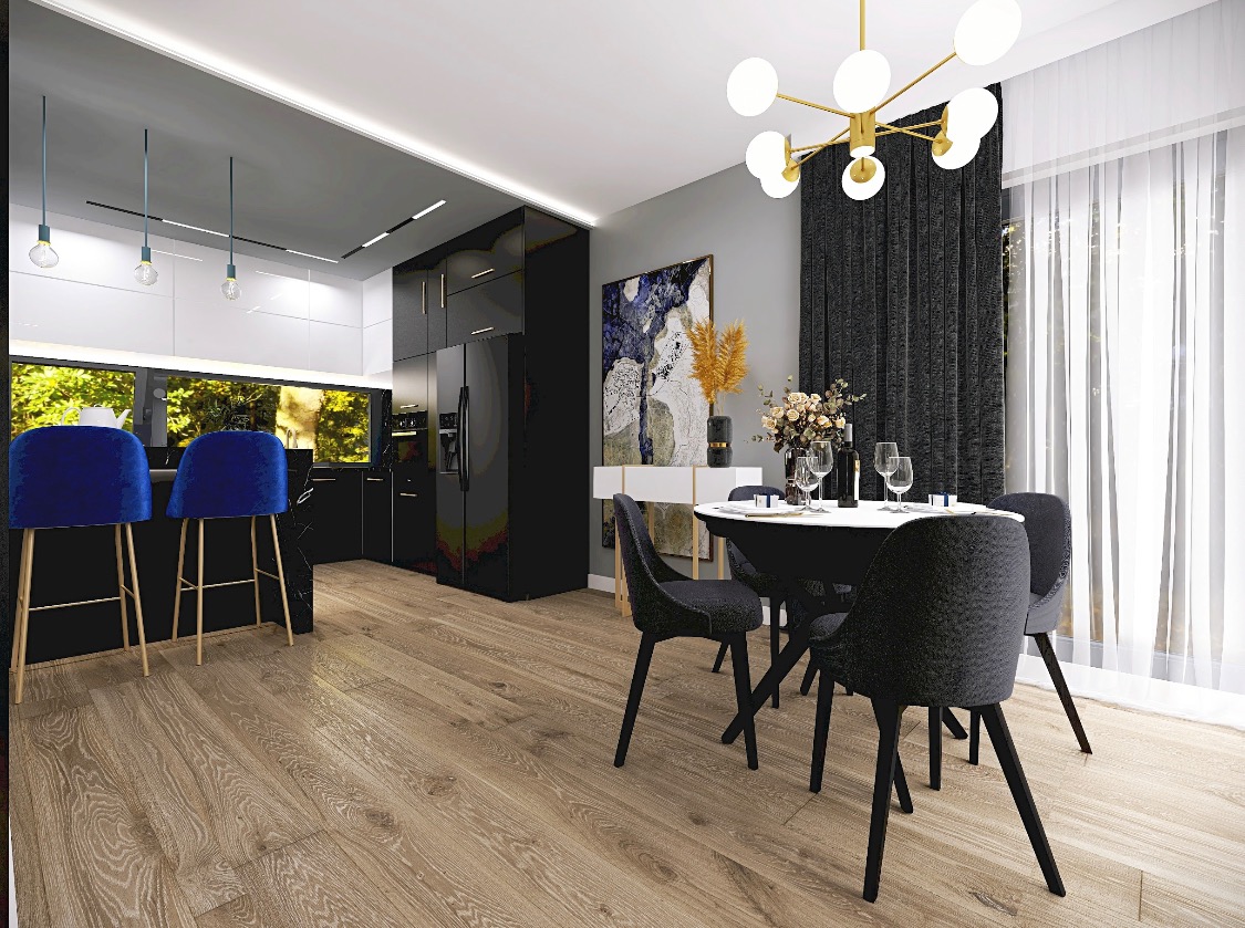 Nowoczesna kuchnia z wyspą i jadalnią: czarne meble, drewniana podłoga, niebieskie hokery, okrągły stół z szarymi krzesłami, abstrakcyjny obraz i dekoracje.