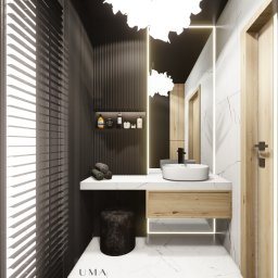 Łazienka w połączeniu drewna i czerni.