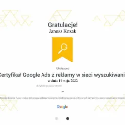 Certyfikat Google Ads z reklamy w sieci wyszukiwania, wydany dla Janusza Kozaka w dniu 19 maja 2022, potwierdzający ukończenie szkolenia.