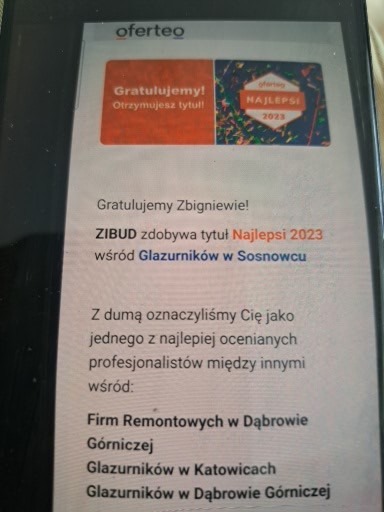 Ekran telefonu z komunikatem Oferteo: 'Gratulujemy! ZIBUD zdobywa tytuł Najlepsi 2023 wśród Glazurników w Sosnowcu'.