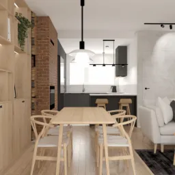Wizualizacja wnętrza mieszkania z otwartą kuchnią, jadalnią i salonem. W jadalni drewniany stół i krzesła. Kuchnia z szarymi szafkami i białymi płytkami na ścianie. Salon z białą sofą i ceglaną...