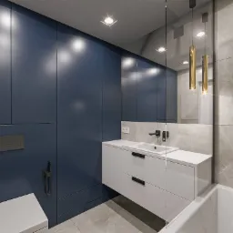 Nowoczesna łazienka z granatową zabudową, białą umywalką i szarą marmurową płytką. Złote lampy wiszące dodają elegancji.