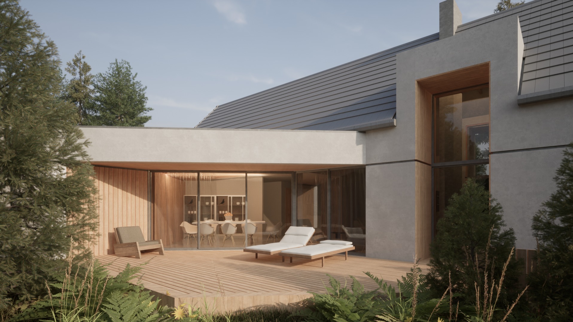 Nowoczesny dom jednorodzinny z drewnianym tarasem, leżakami i widokiem na wnętrze jadalni przez szklane drzwi przesuwne.