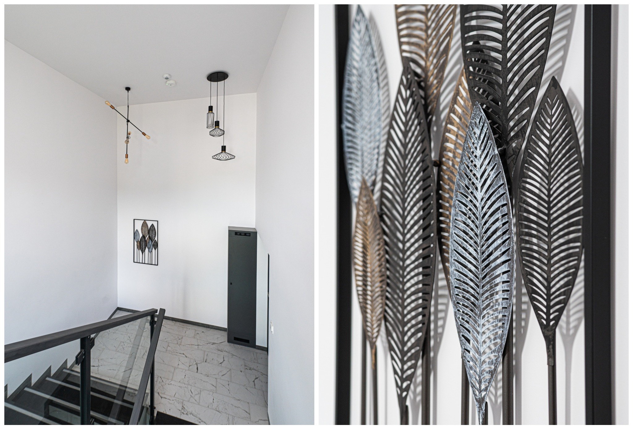 Nowoczesne wnętrze klatki schodowej z metalową dekoracją ścienną w kształcie liści, minimalistycznymi lampami i szklaną balustradą. Marmurowe płytki podłogowe.