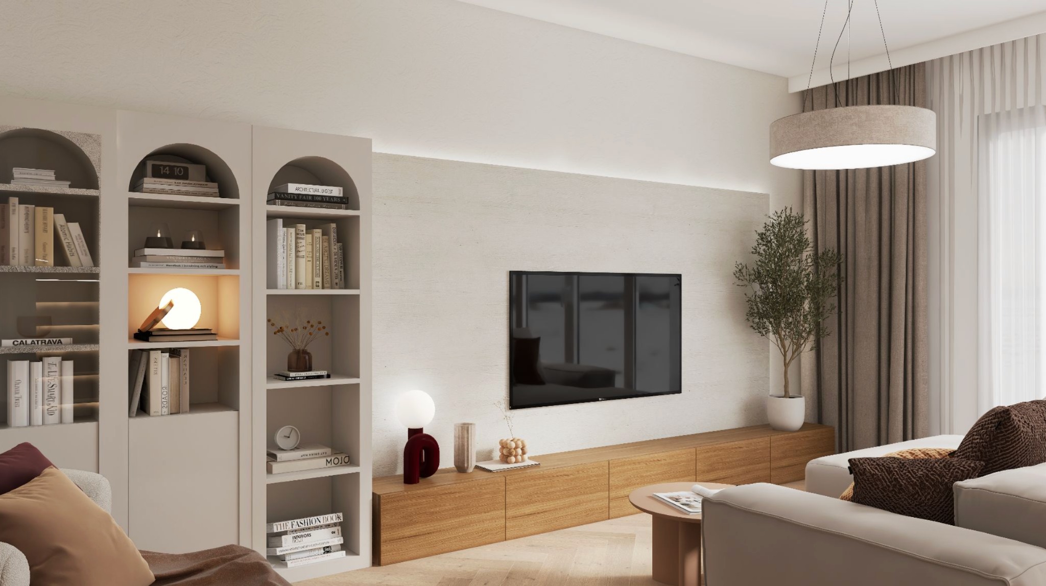 Jasne wnętrze salonu z regałami wnękowymi, telewizorem na ścianie i beżową sofą. Minimalistyczny design z elementami dekoracyjnymi i rośliną doniczkową.