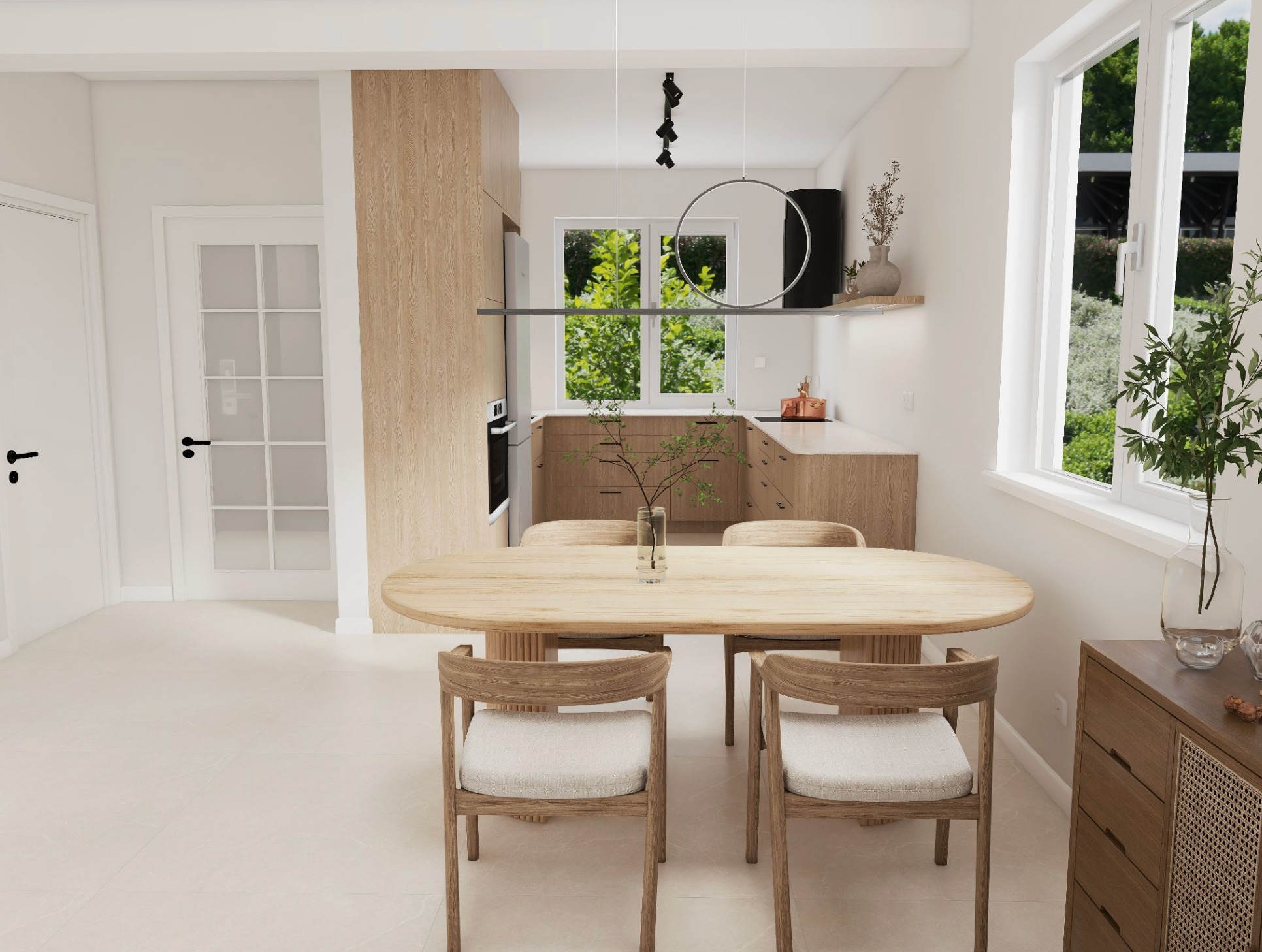 Jasna jadalnia z drewnianym stołem i krzesłami, minimalistyczna kuchnia w tle. Nowoczesne oświetlenie i rośliny dodają wnętrzu przytulności. Ujęcie z niskiego kąta.