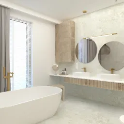 Nowoczesna łazienka z wolnostojącą wanną, dwoma okrągłymi lustrami nad umywalkami i drewnianymi akcentami, oświetlona wiszącą lampą z ażurowym kloszem.