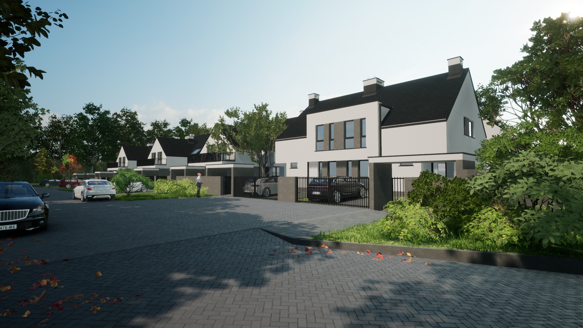 Wizualizacja szeregu nowoczesnych domów z czarnymi dachami i białymi elewacjami, otoczonych zielenią, z samochodami na podjeździe i osobą stojącą przed jednym z domów.