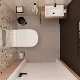 Wnętrze łazienki z perspektywy z góry, ukazujące białą toaletę, umywalkę na drewnianym blacie, ścianę z terazzo, czarny kosz na śmieci oraz obraz z motywem palm na ciemnej ścianie.