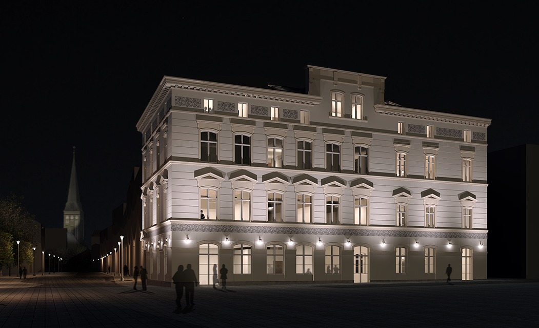 Nocna wizualizacja budynku usługowego z oświetloną elewacją, widok na ulicę z sylwetkami przechodniów i kościelną wieżą w tle.