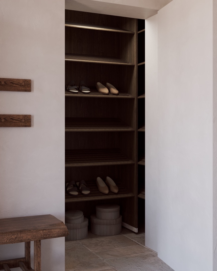 Wnęka z półkami na buty, drewniany stołek i wieszaki. Minimalistyczny design, naturalne materiały, ciepłe oświetlenie. Półki z obuwiem w neutralnej tonacji.