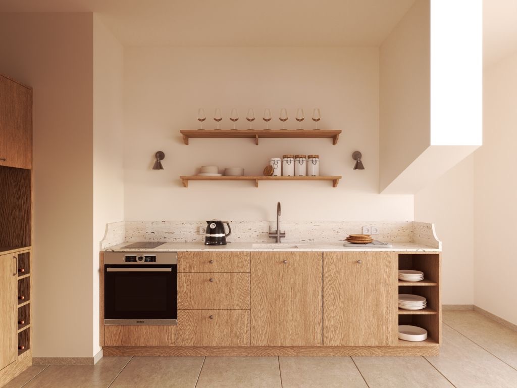 Minimalistyczna kuchnia z drewnianymi frontami, jasnym blatem i półkami z dekoracjami. Ujęcie z niskiego kąta, podkreślające przestrzeń i naturalne światło.