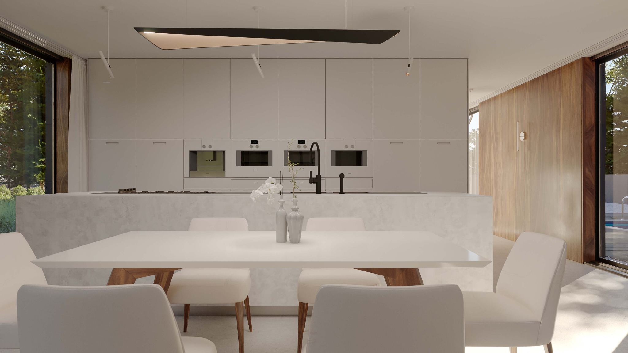 Jasna, minimalistyczna kuchnia z wyspą i białym stołem jadalnym, widok na ogród przez duże okno, nowoczesne oświetlenie.