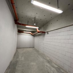 Vertra sp. z o.o. - Montaż lamp w pomieszczeniu rowerowni