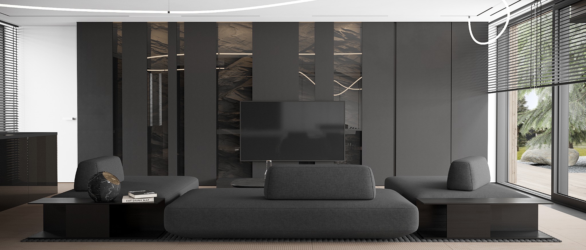 Elegancki salon w odcieniach szarości z minimalistycznym wystrojem, zawierający modułową sofę, telewizor na tle ściany z teksturą kamienia i designerskie oświetlenie.