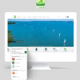 Prezentacja responsywnej strony internetowej na monitorze i smartfonie, widok na jezioro z żaglówkami, logo LGD9 w rogu.