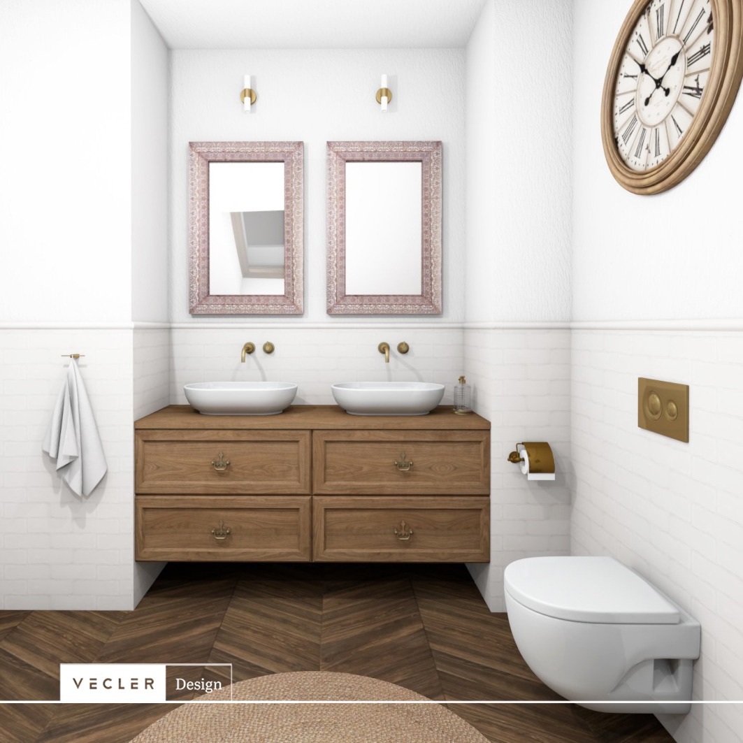 Elegancka łazienka z dwoma umywalkami nablatowymi, drewnianą szafką z szufladami, dwoma lustrami w ozdobnych ramach, wiszącym zegarem i parkietem ułożonym we wzór jodełki.