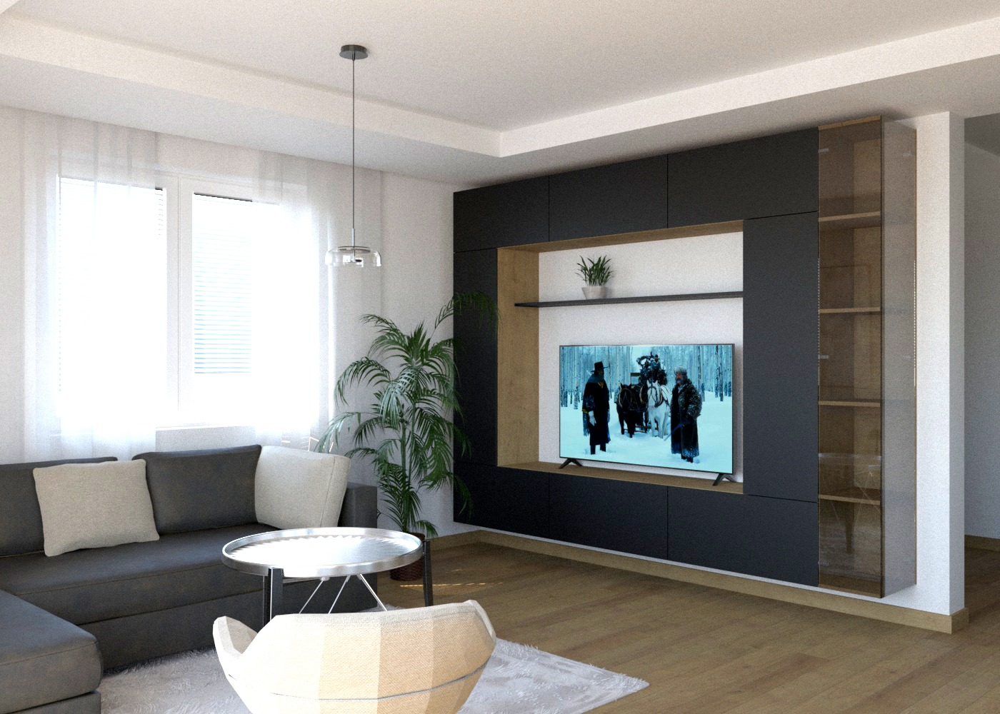 Nowoczesny salon z czarną zabudową meblową, telewizorem wyświetlającym scenę z filmu, szarą sofą, okrągłym stolikiem kawowym i rośliną doniczkową.