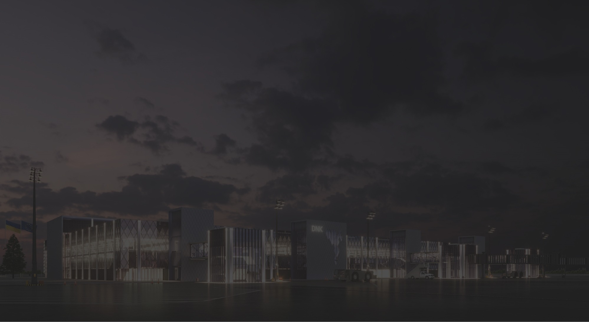 Wizualizacja hali przemysłowej z przeszkloną fasadą oświetloną od wewnątrz, widoczna flaga Ukrainy i oświetlenie zewnętrzne, na tle zachmurzonego nieba o zmierzchu.