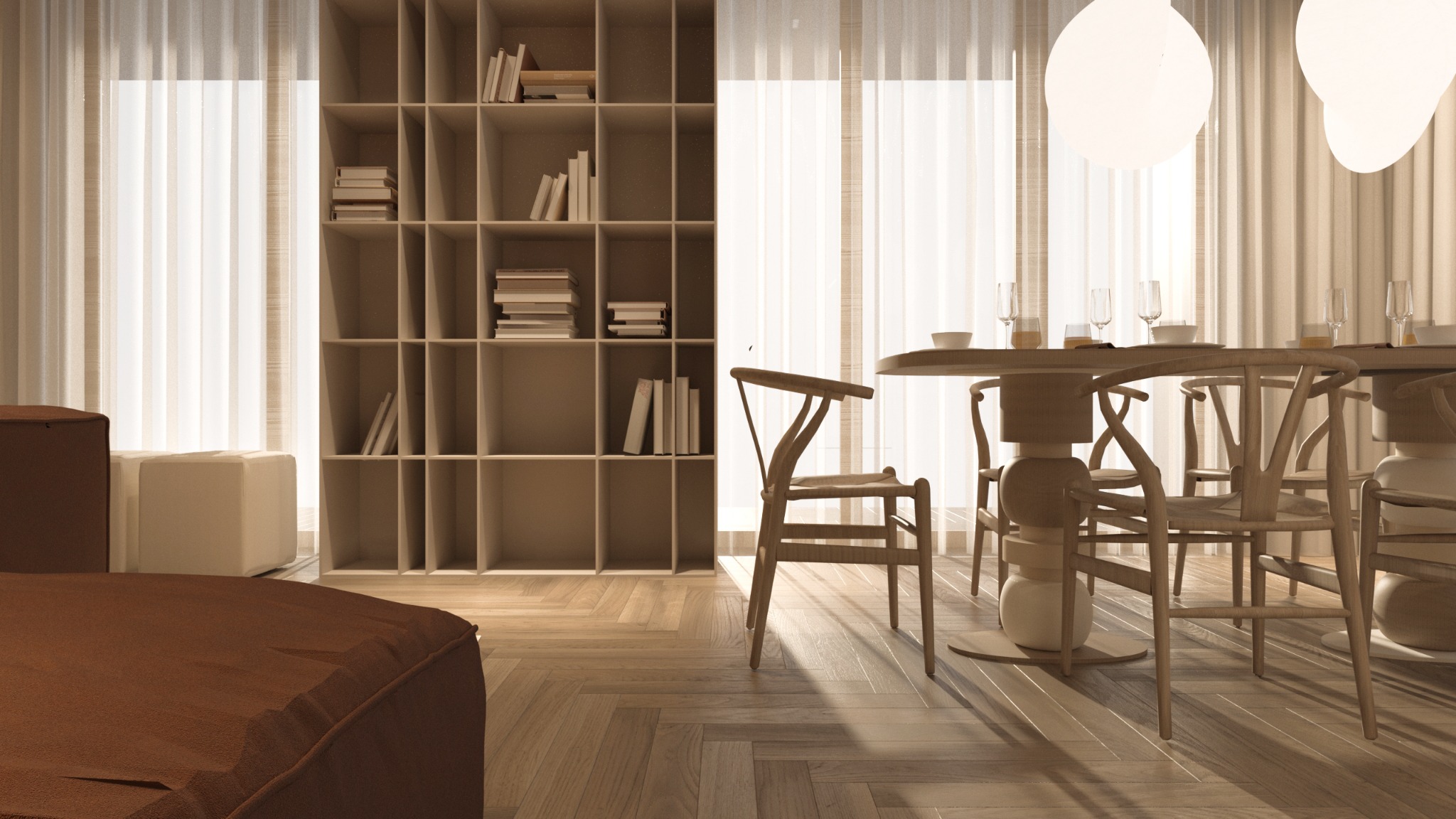 Jasne wnętrze mieszkania z parkietem w jodełkę, regałem z książkami, okrągłym stołem z nakryciem i krzesłami Wishbone oraz brązową sofą.