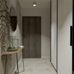 Nowoczesny przedpokój z dekoracyjną tapetą w motywy roślinne, owalnym lustrem, konsolą z terrarium, drewnianymi drzwiami i szafą z ryflowanymi frontami.