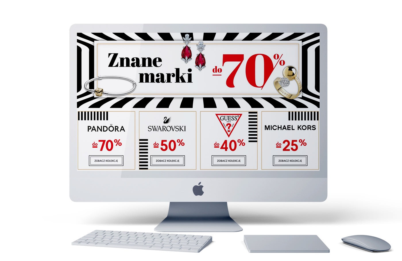 Ekran komputera iMac wyświetlający landing page z ofertami promocyjnymi znanych marek biżuterii i akcesoriów, takich jak Pandora, Swarovski, Guess i Michael Kors, z informacją o rabatach do 70%.