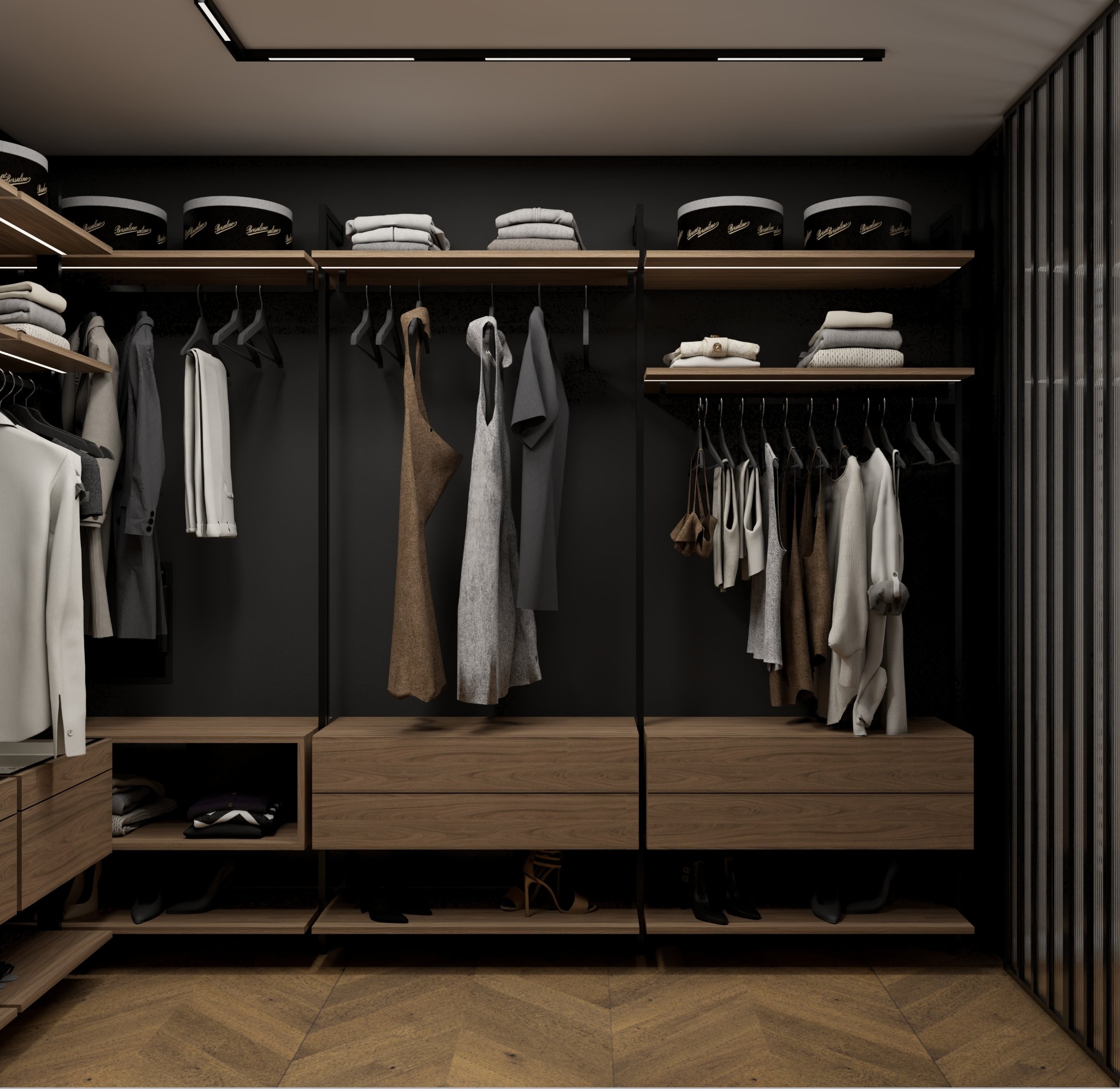 Nowoczesna garderoba z oświetleniem LED, drewnianymi szufladami i czarnym tłem. Ubrania na wieszakach, pudełka na półkach. Parkiet w jodełkę na podłodze.