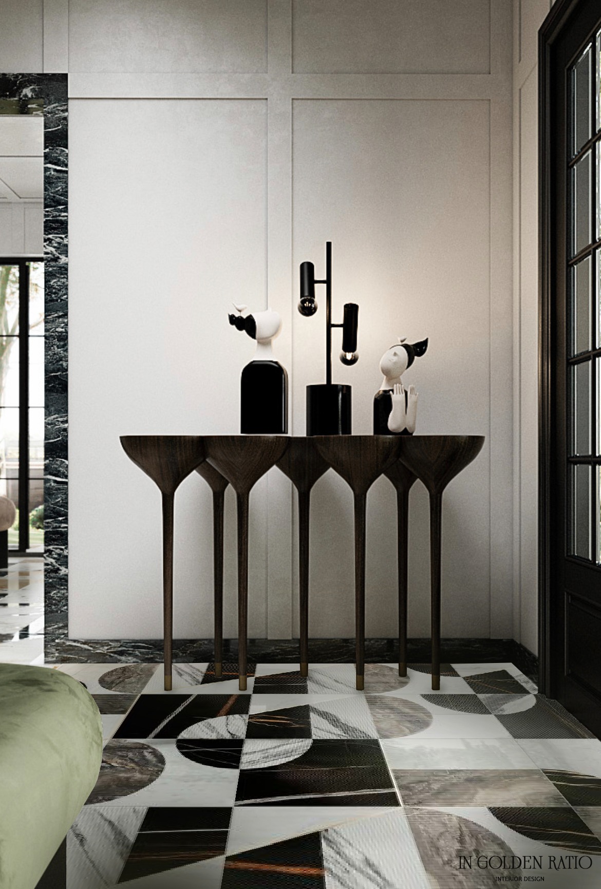 Nowoczesna aranżacja przedpokoju z konsolą o nietypowych nogach, dekoracyjnymi figurkami i lampą na tle białych paneli ściennych i wzorzystej podłogi.