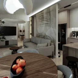 Wnętrze mieszkania z drewnianym stołem z owocami, szarą sofą i nowoczesną kuchnią w tle. Minimalistyczny design, ciepłe oświetlenie, drzewko w donicy dodaje naturalnego akcentu.